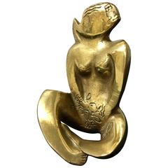 Mid-Century Signed Figurative Sculpture Paperweight of a Woman Sitting in Brass