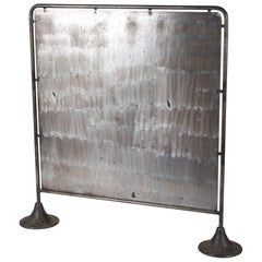 A Mid-Century Industrial Metal Screen