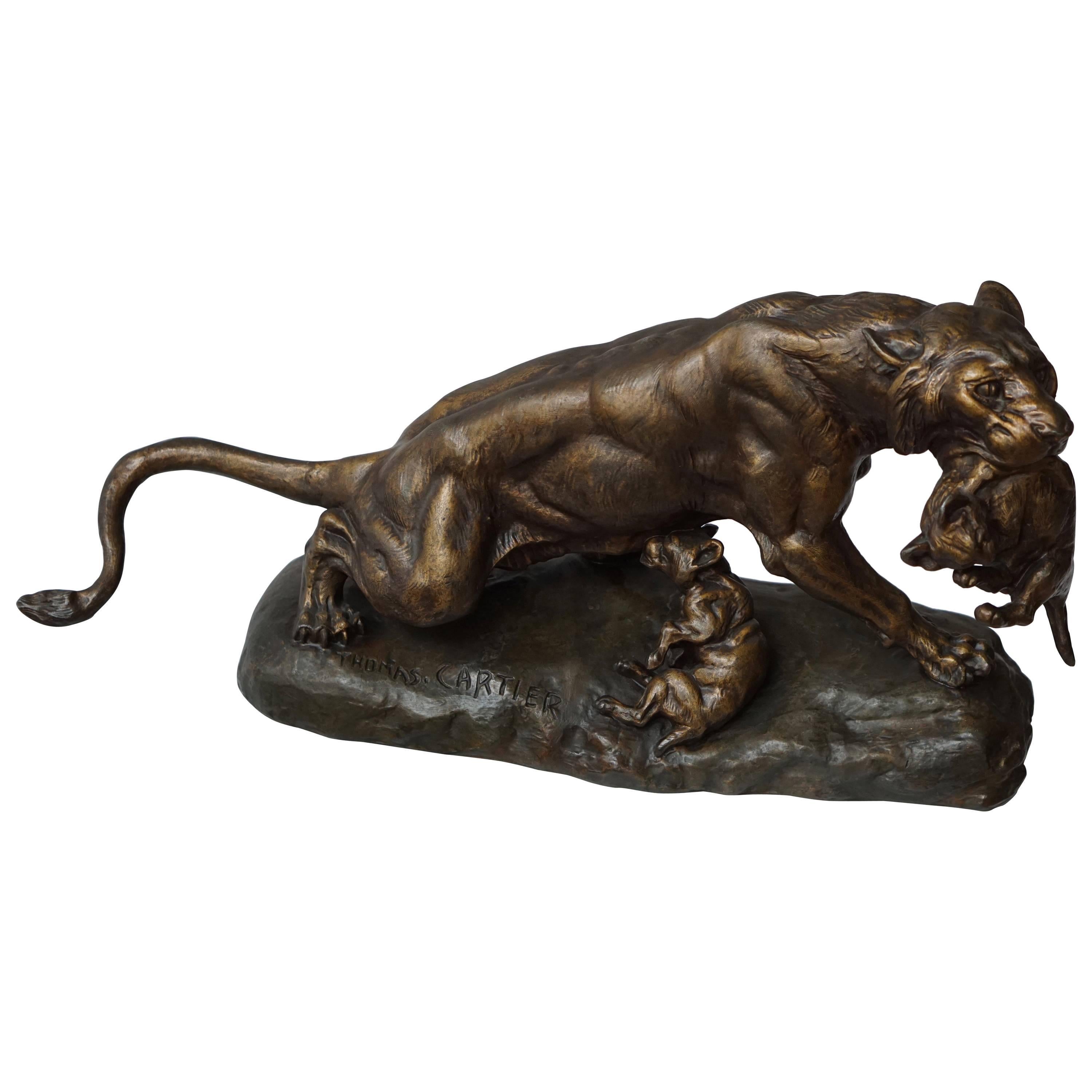 A Gilt Spelter Lioness with her Cubs, Signed Thomas Cartier