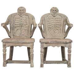 Early 20th Century Pair of Carved Oak Skeleton Face Chairs