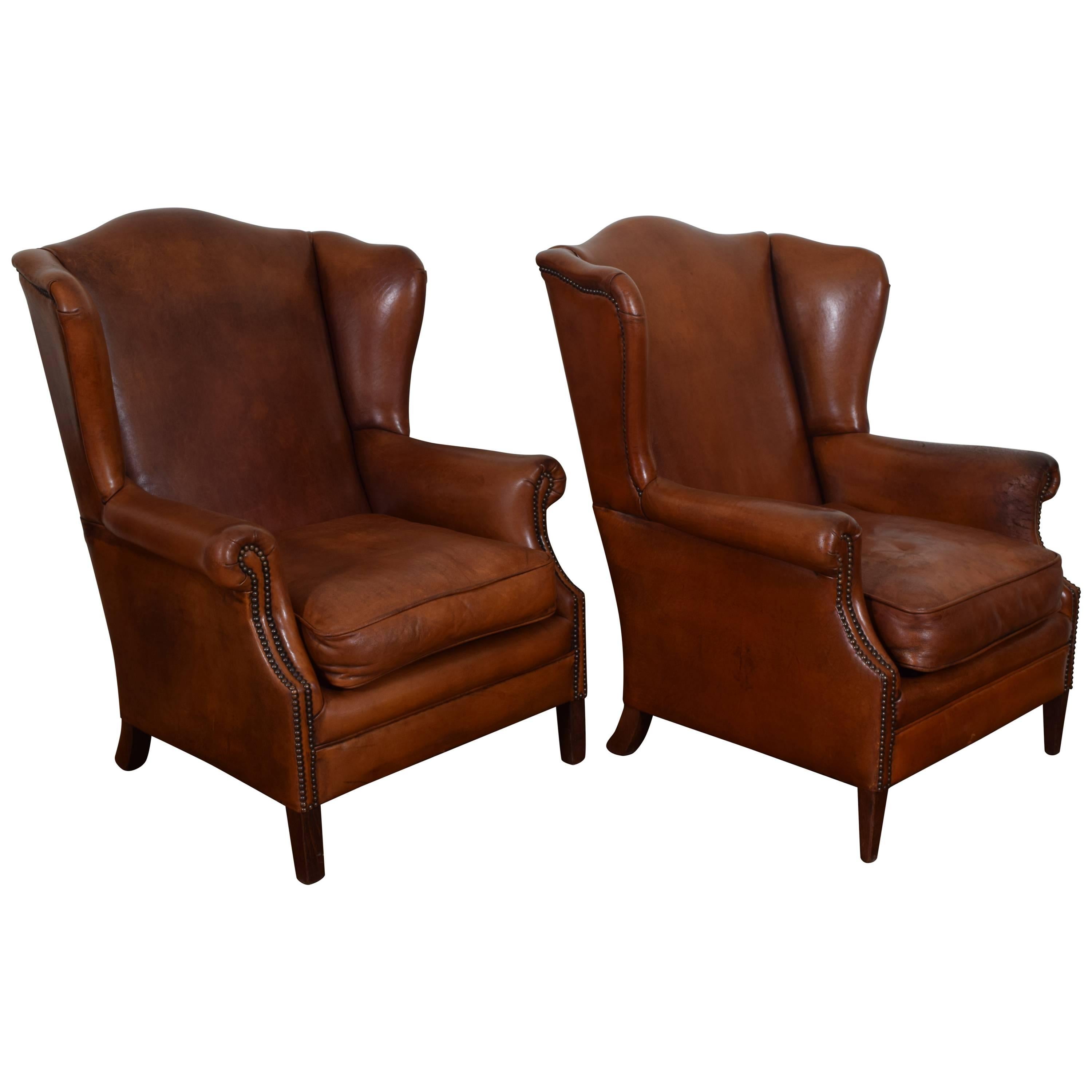 French Pair of Chestnut Leather Wing Chairs, Second Quarter of the 20th Century