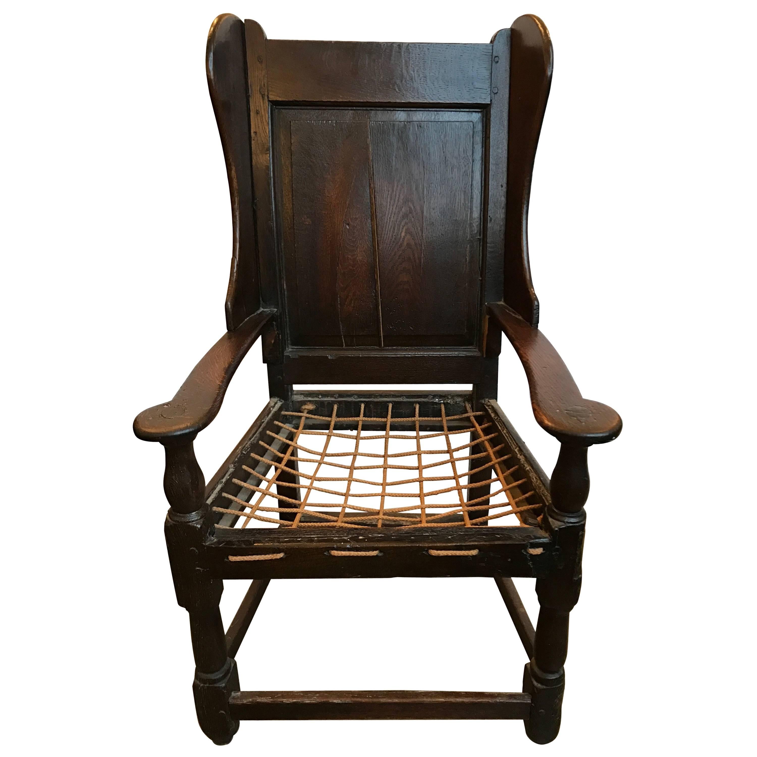 18th Century English Oak Wing Chair with Rope Seat For Sale