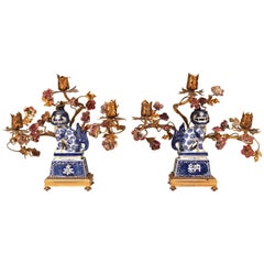 Pair of French Bronze Candelabra with Chinese Porcelain Foo Dogs