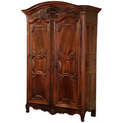Large 18th Century French Louis XV Carved Walnut Armoire from Lyon