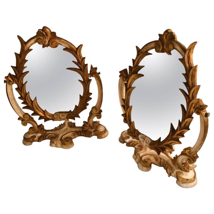 Two Venetian Parcel-Gilt Easel Mirrors