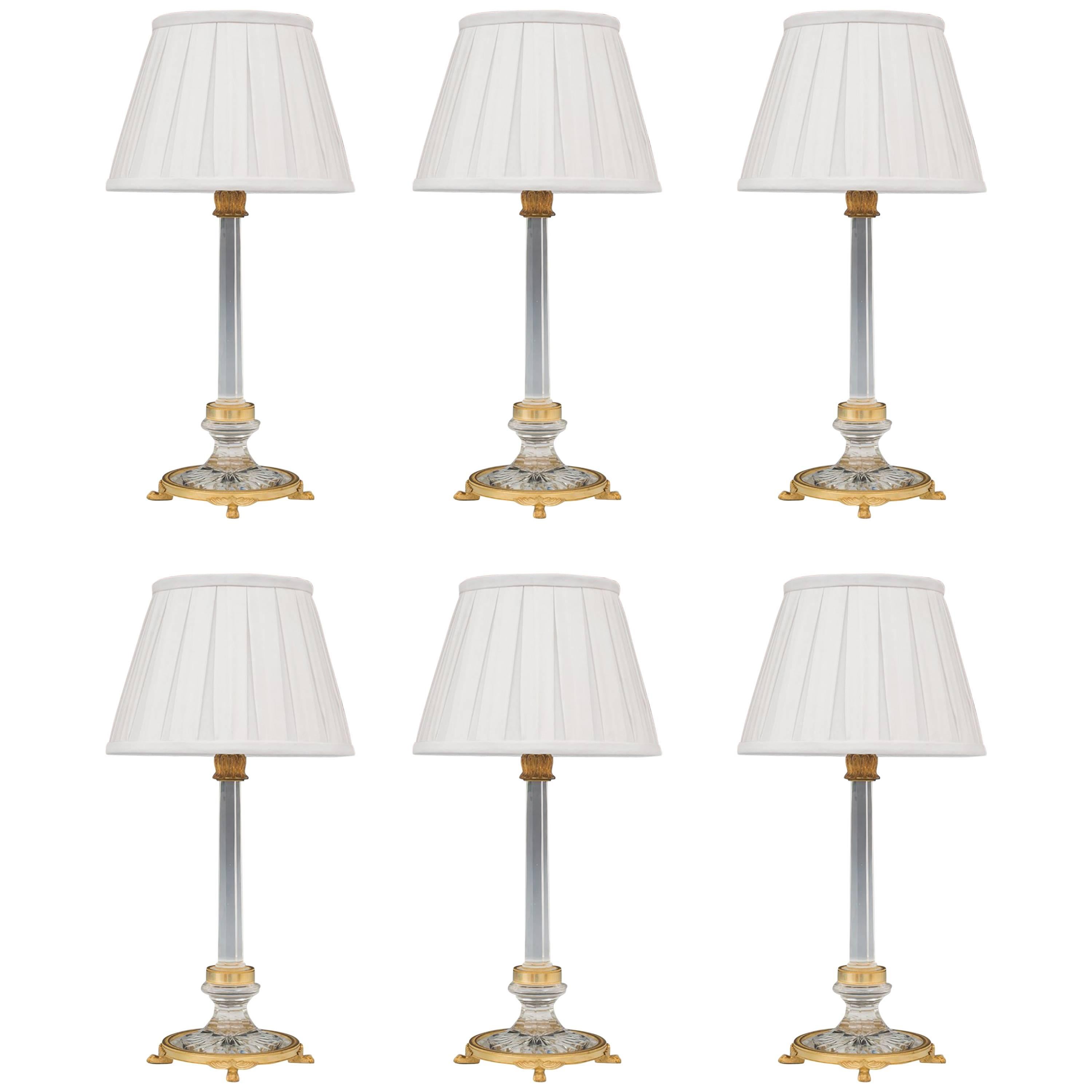Ensemble de six lampes en verre taillé et montées en bronze doré en vente