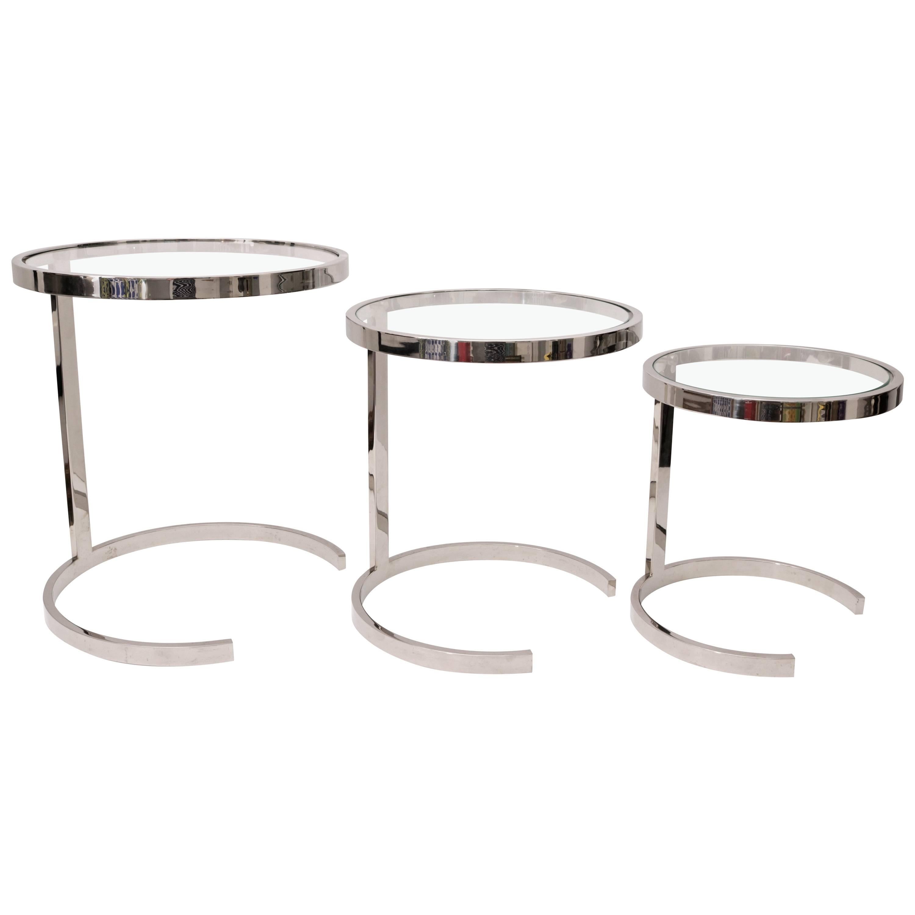 Brueton, Set of Three Nesting Tables in Polished Steel and Glass