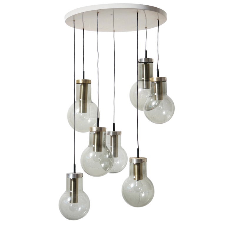 Lustre suspendu Compositie Maxi Lamp avec 7 pendentifs en verre et aluminium RAAK