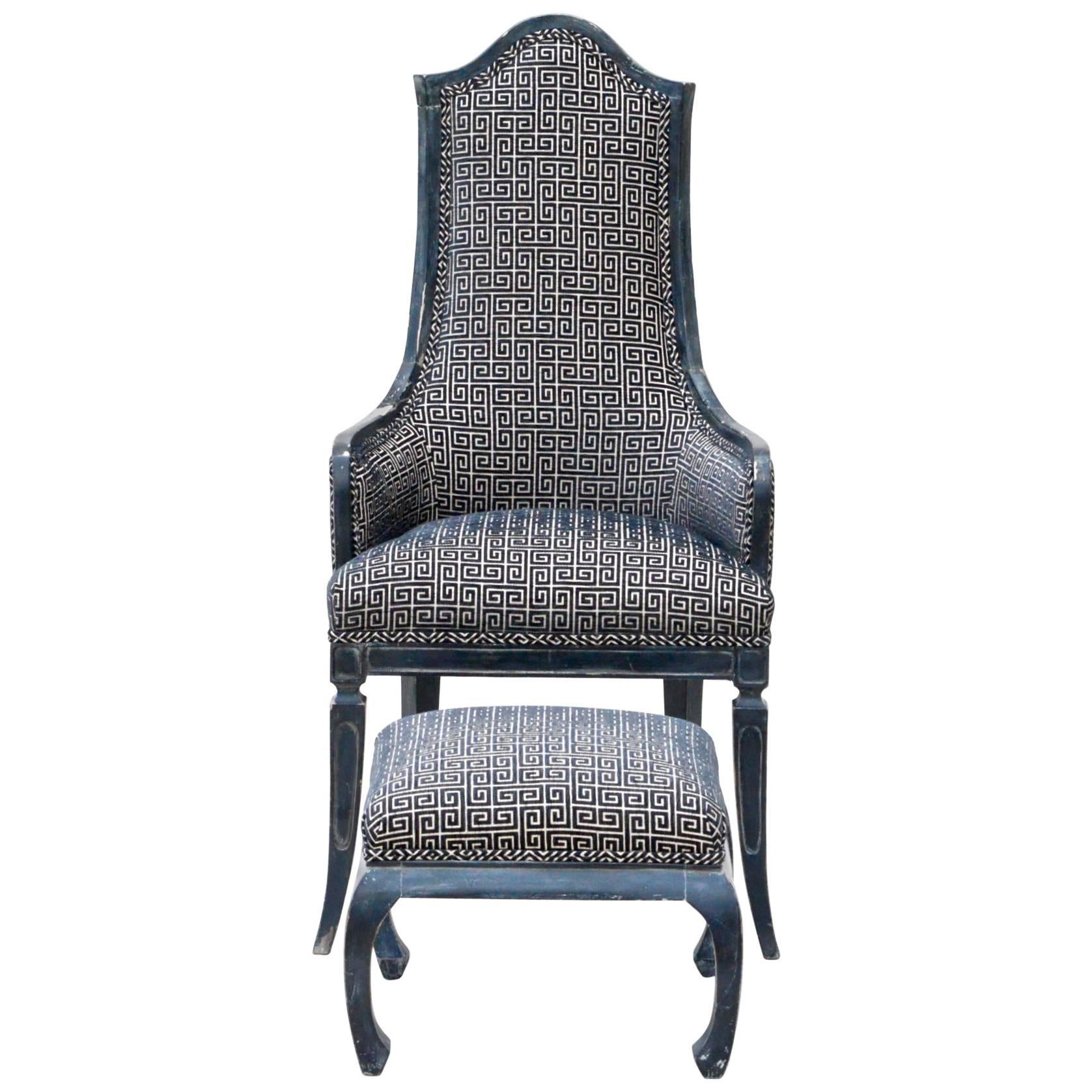 Vintage lounge chair with ottoman in the Chinese chippendale taste. The curvaceous and sharp lines of these pieces are set off by a fetching Greek key fabric which was just employed throughout. Frames are presented in a custom 