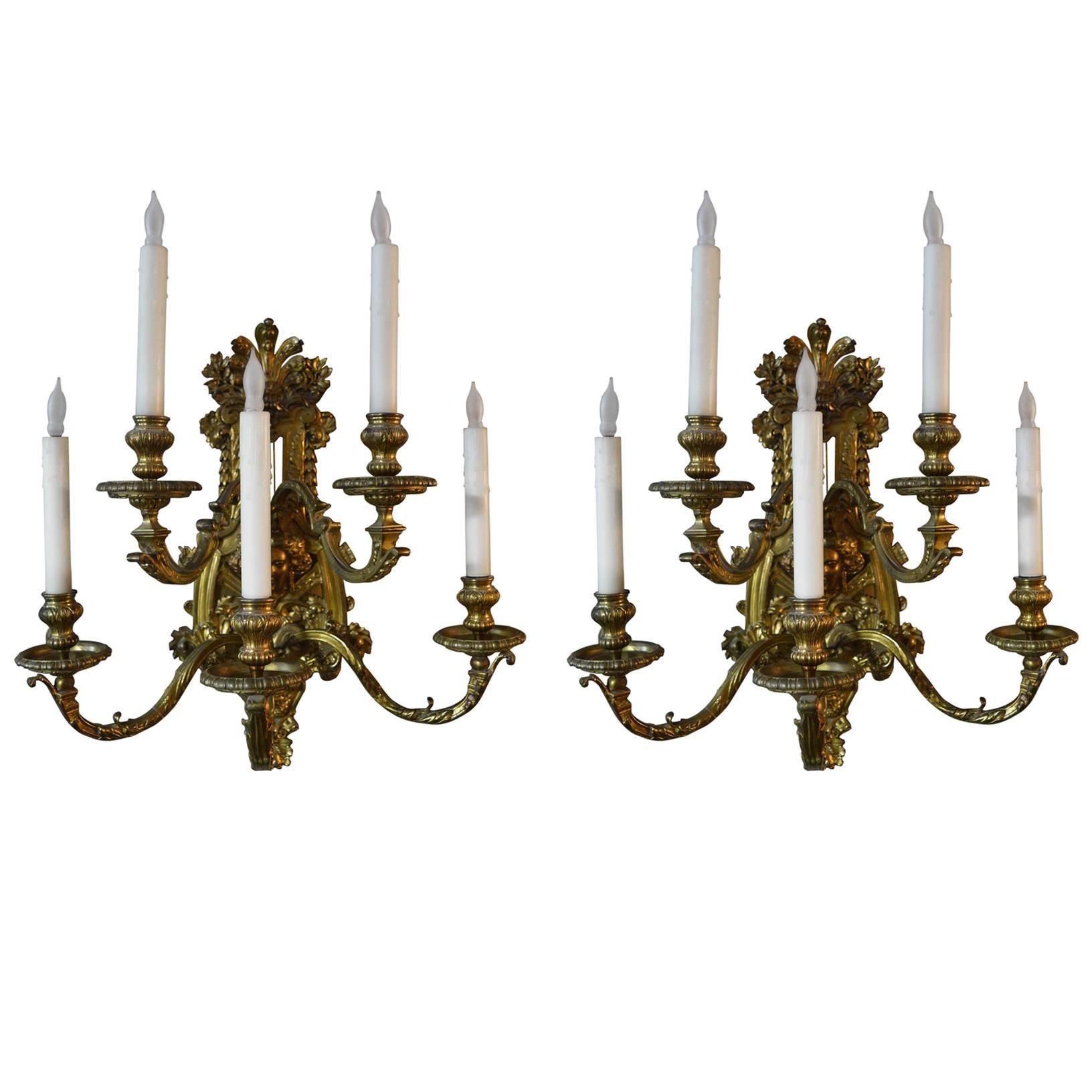 Pair of Detailed Brass Sconces For Sale