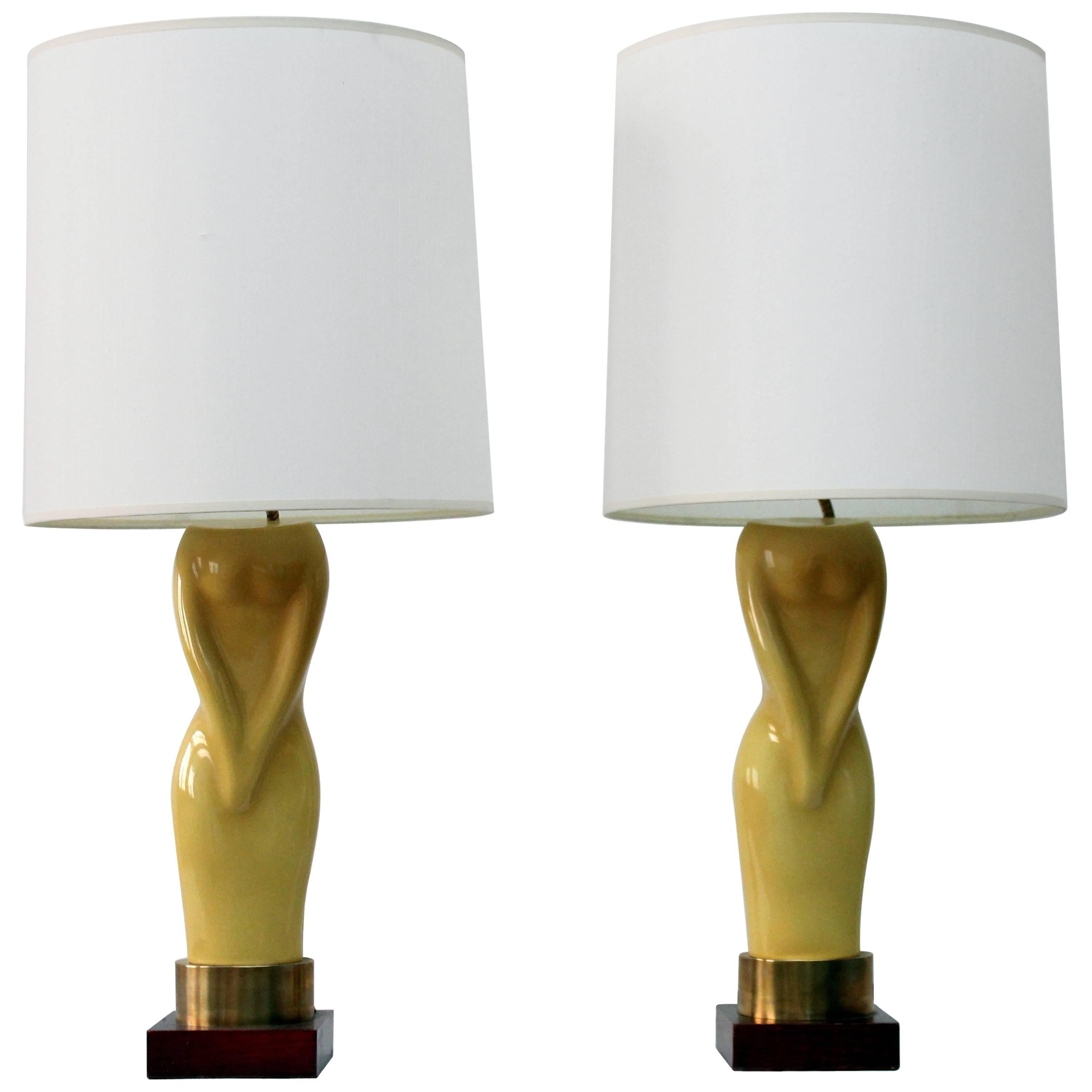 Pair of Womens Figural Yellow Lamps with White Shades For Sale