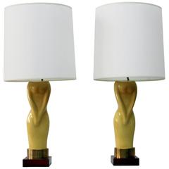 Pair of Womens Figural Yellow Lamps with White Shades