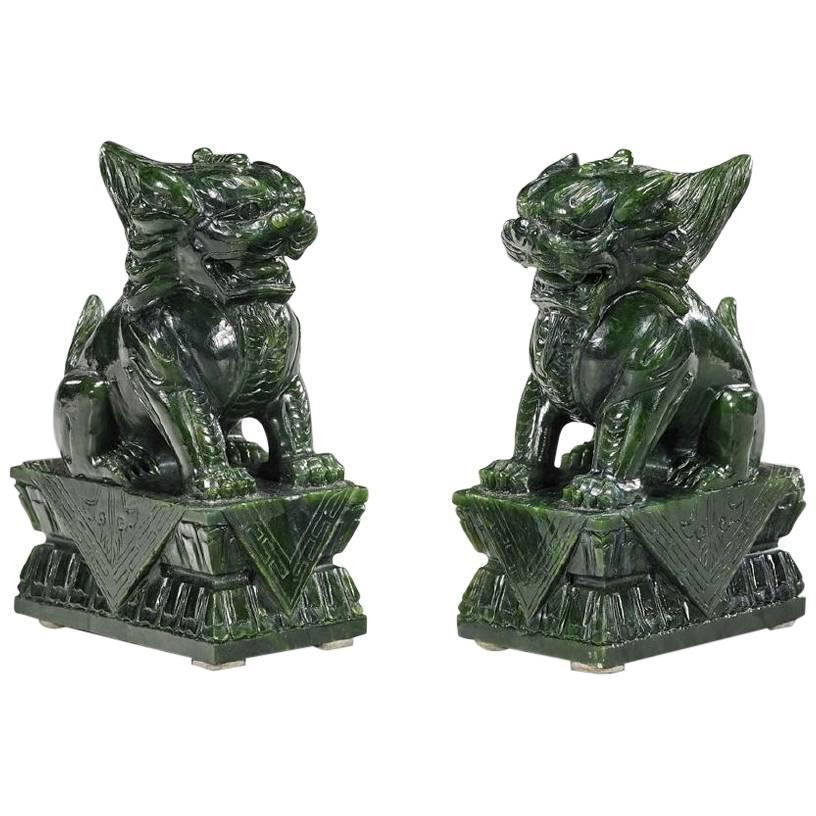 Pair of Chinese Carved Lion Sculptures in Spinach Jade on Lotus Pedestal For Sale