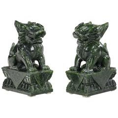 Pair of Chinese Carved Lion Sculptures in Spinach Jade on Lotus Pedestal