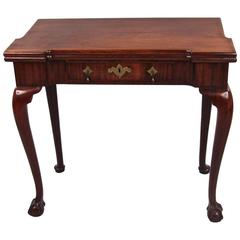 George II Mahogany Flip-Top Games Table with Ball and Claw Feet