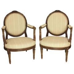 Antique Large Pair of 19th Century Louis XVI Style Walnut Fauteuils or Armchairs