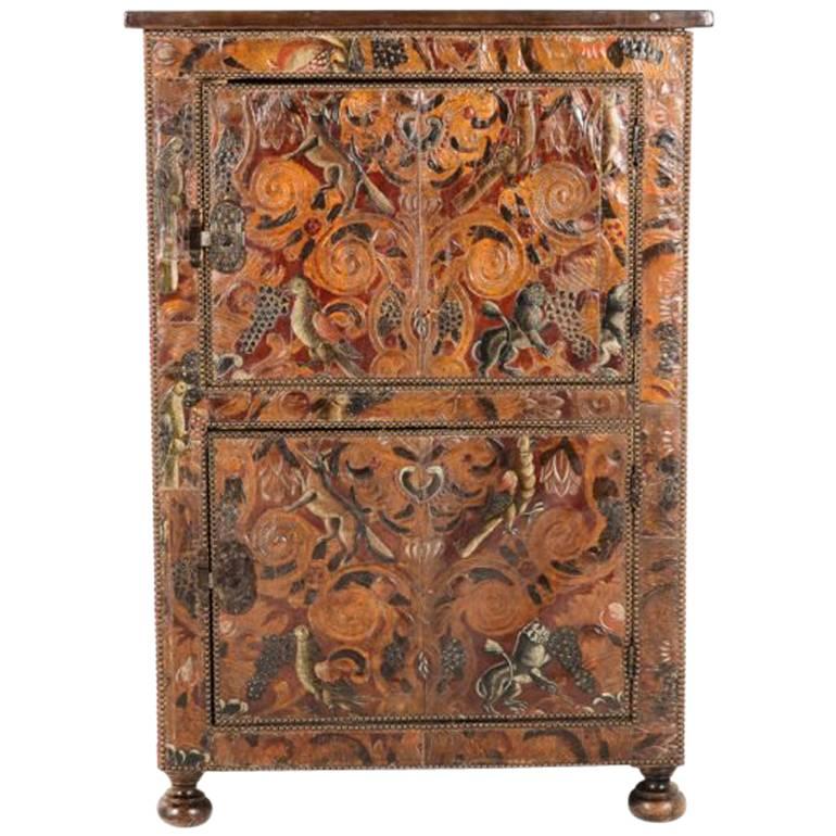 Two-Door Cabinet with 19th Century Hand Tooled Leather Covering