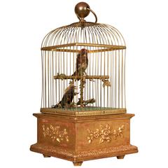 Oiseaux chanteurs d'automatisation français de la fin du XIXe siècle dans une cage en bois doré et en laiton