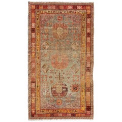 Central Asia Antique Khotan Rug with Floral Geometrics