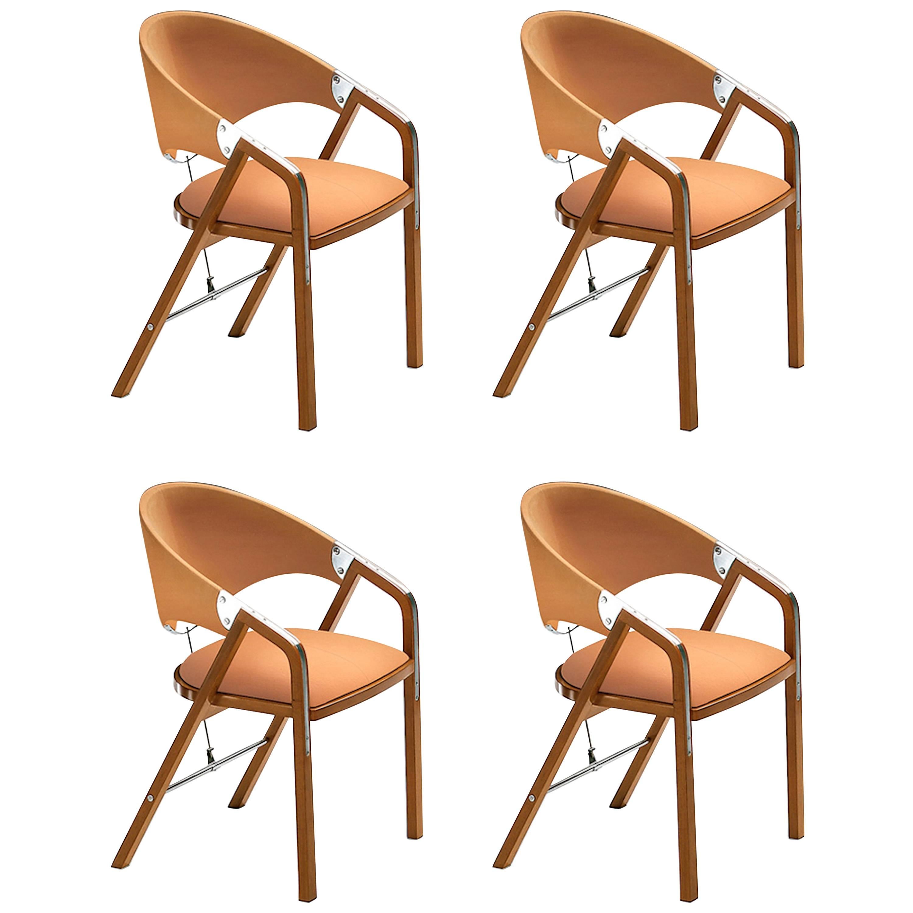Four Chairs in Ligth Walnut. Designed by J. Tresserra, 1987