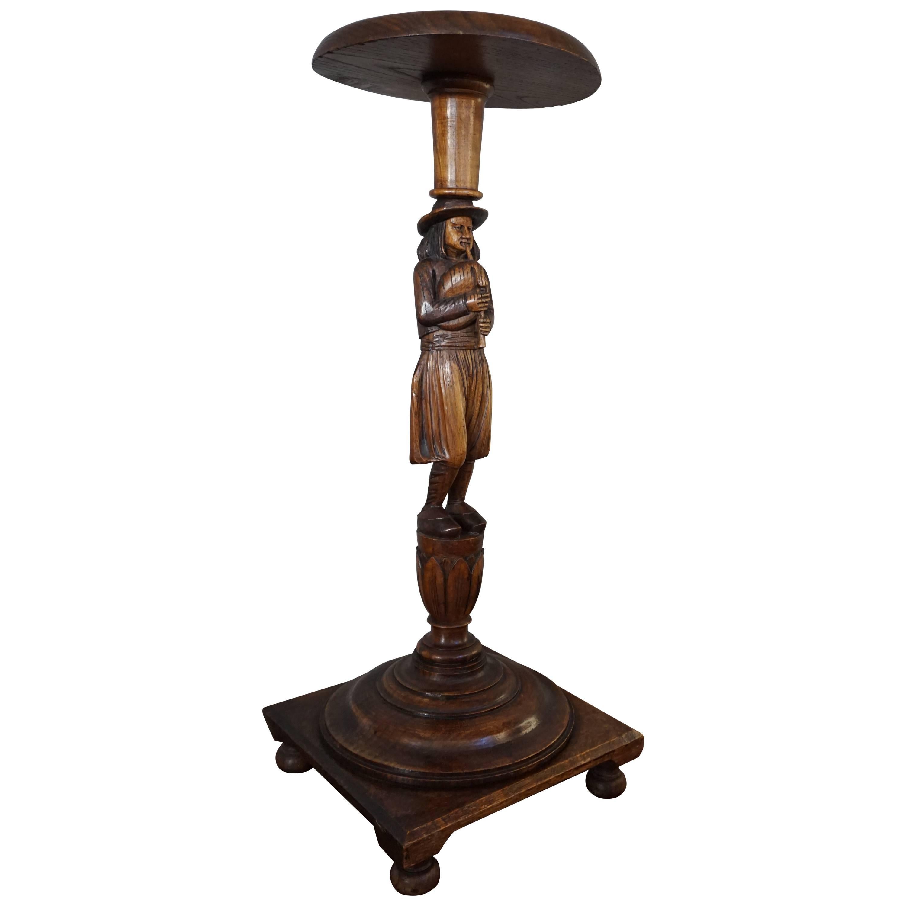 Antique Oak Plant Stand Pedestal with Carved Bagpipe Playing Piper Man Sculpture For Sale