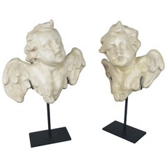 Pair of Papier Mâché Cherubs on Iron Bases