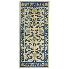 Alfombra china azul marfil del siglo XX
