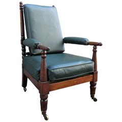Early 19th Century English Mahogany Bobbin Turned Library Chair with Casters