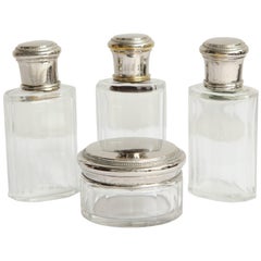 Vintage Set of Four Toiletry Bottles with Covered Jar