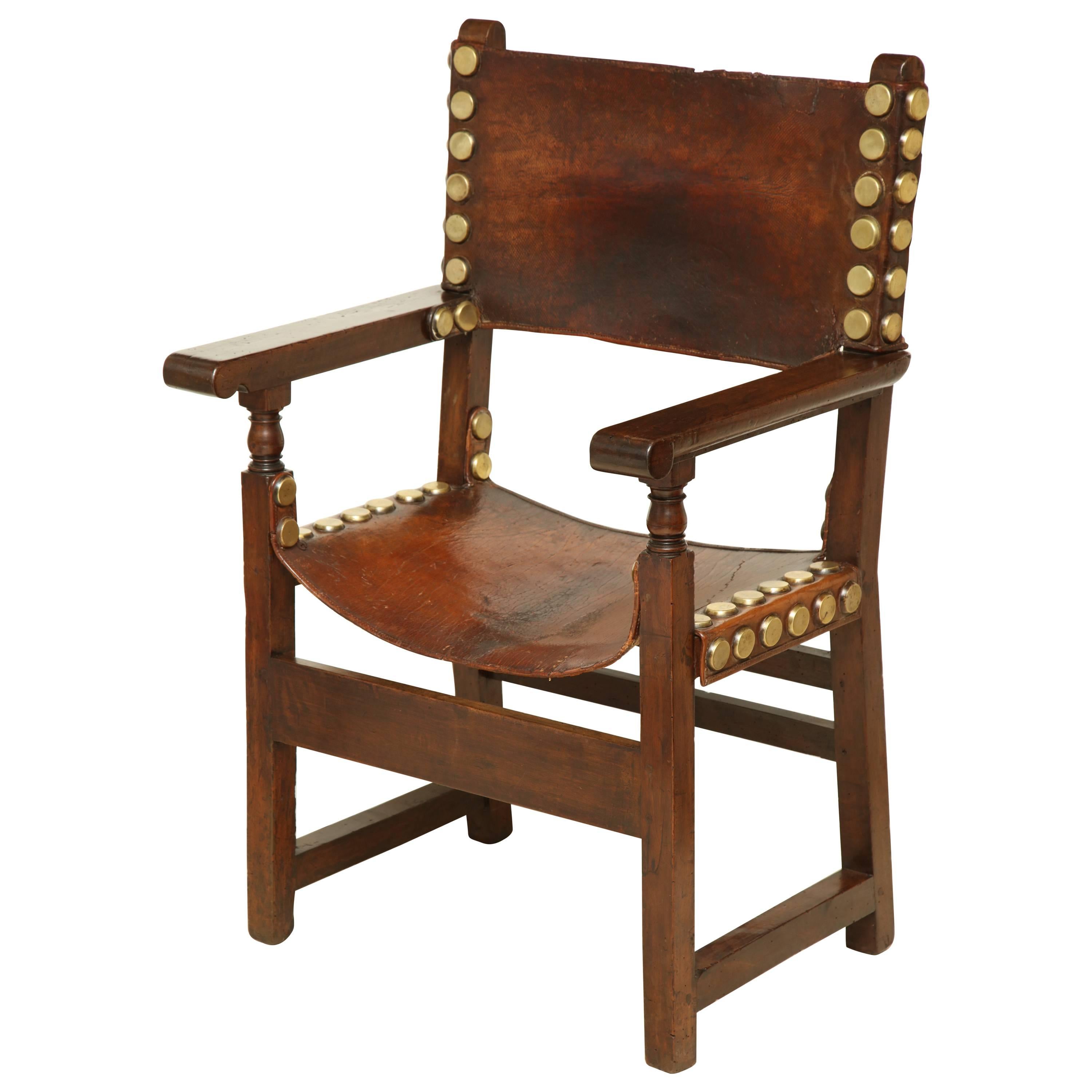 17th Century Spanish Walnut and Leather Armchair with Oversized Brass Nailheads