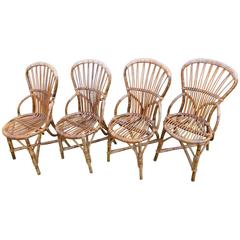 Beautiful Set of Four Wicker Chair by Audoux Minet, circa 1960