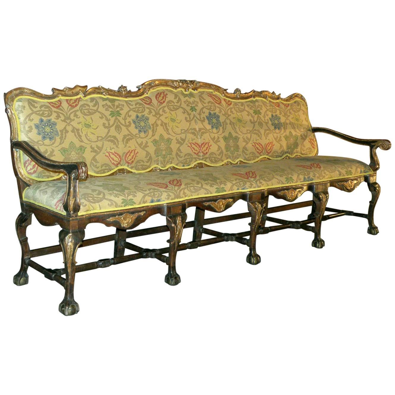 Long 18th Century Carved and Parcel-Gilt Spanish / Portuguese Settee For Sale