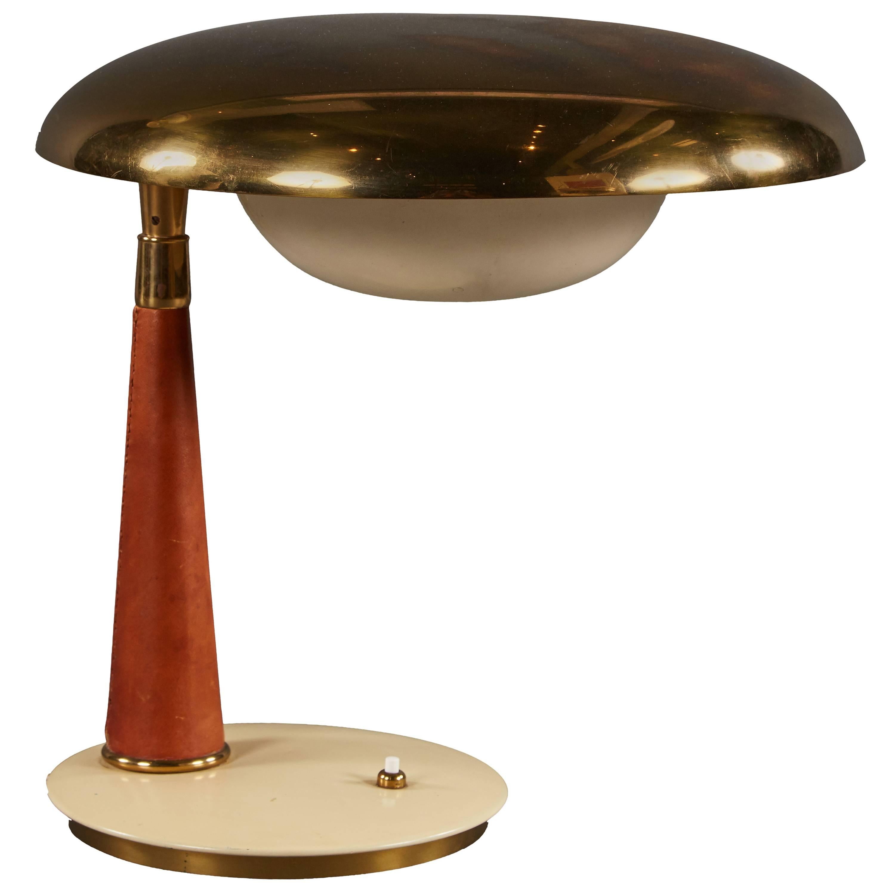 Striking Angelo Lelii Leather and Brass Table Lamp for Arredoluce For Sale