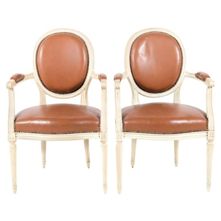 Matched Pair of Painted and Leather Louis XVI Style Armchairs, circa 1950