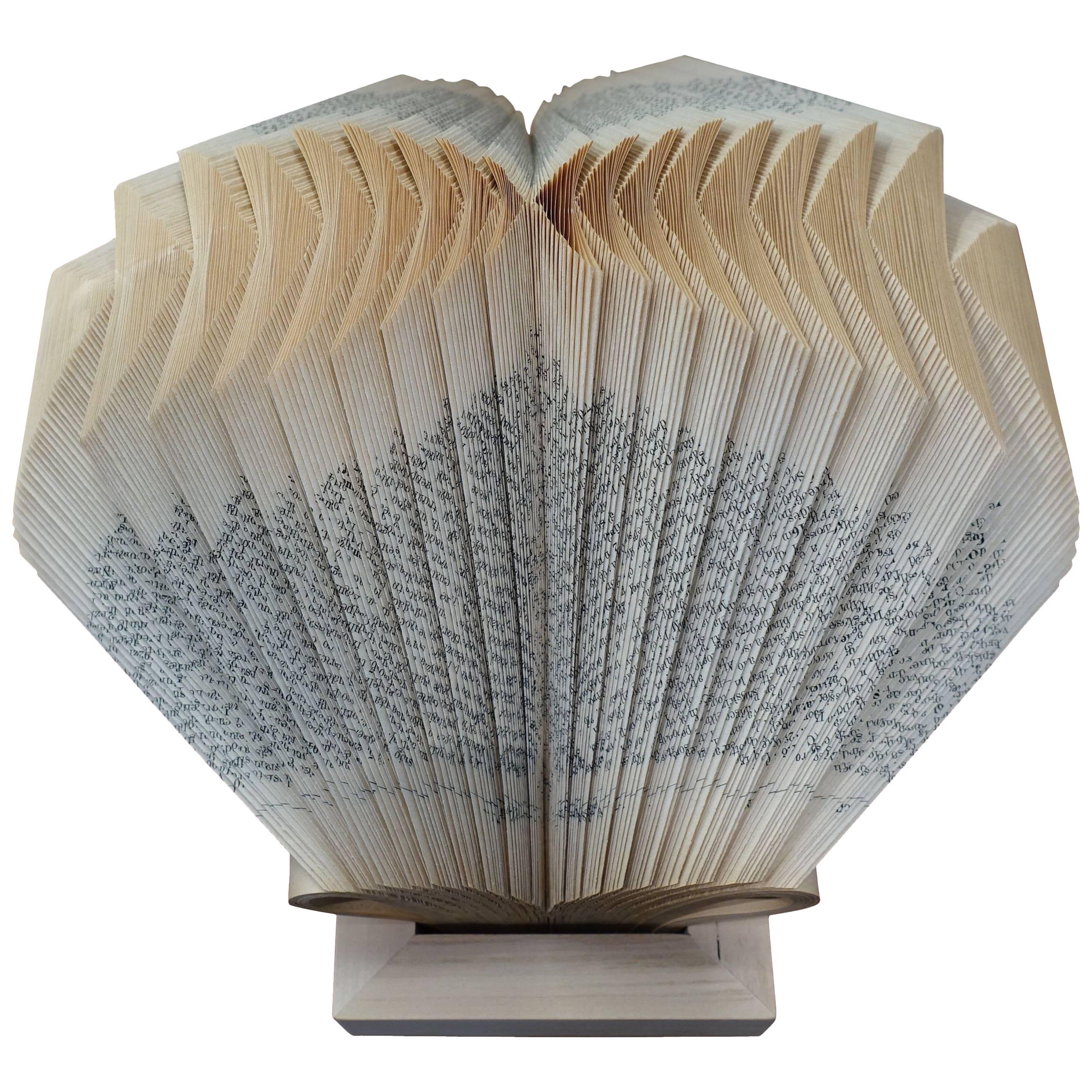 Contemporary Italian hand folded pages from vintage book to create decorative sculpture.
Base solid wood.