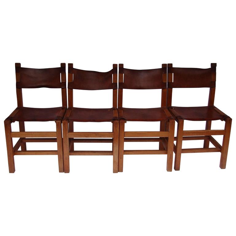 1970s French Set of Four Solid Elm and Leather Dining Chairs by Maison