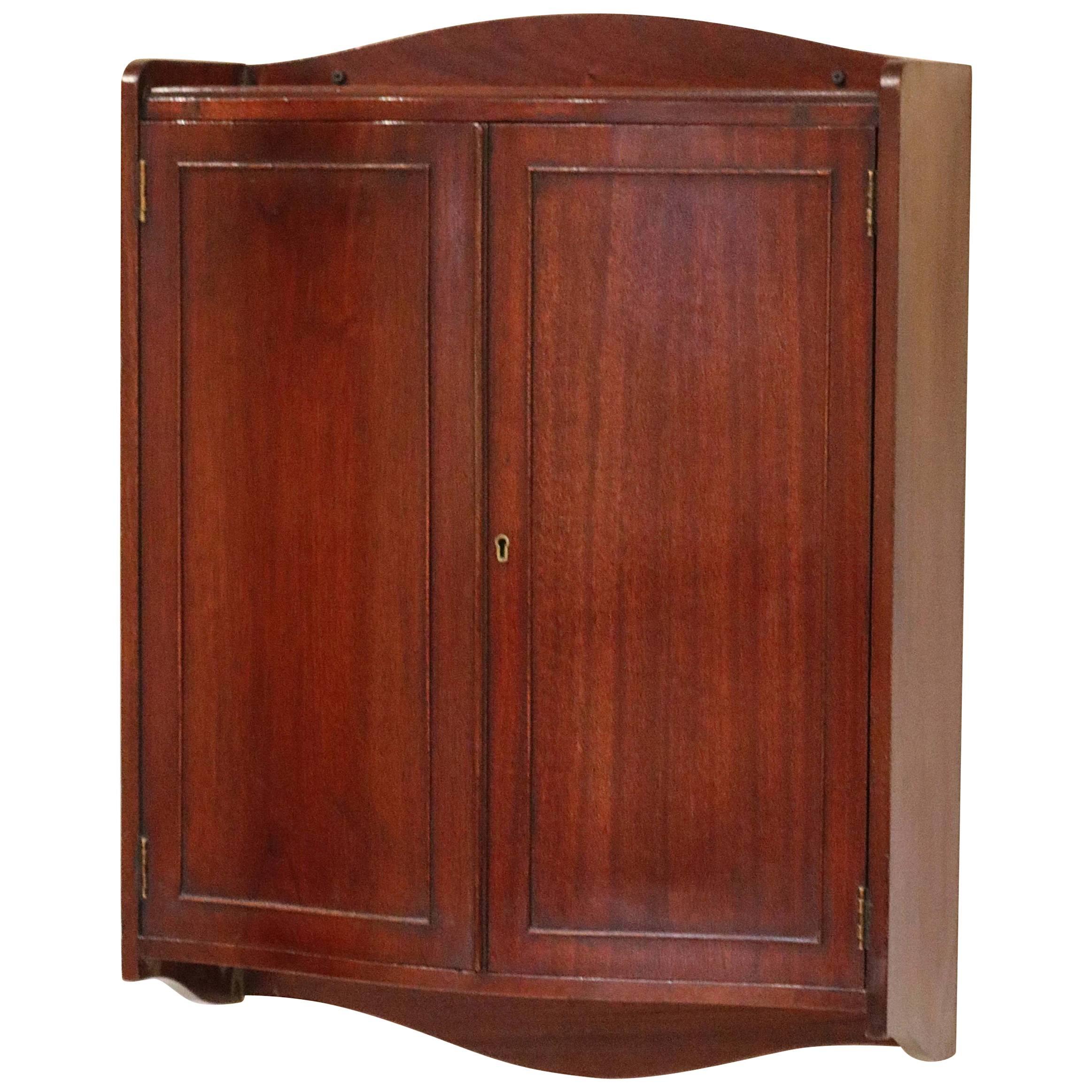 Mahogany Serpentine Front Wall Cabinet For Sale