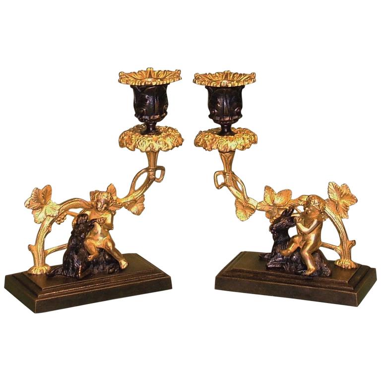 Pair of 19th Century Bronze and Ormolu Cherub and Ram Candlesticks For Sale