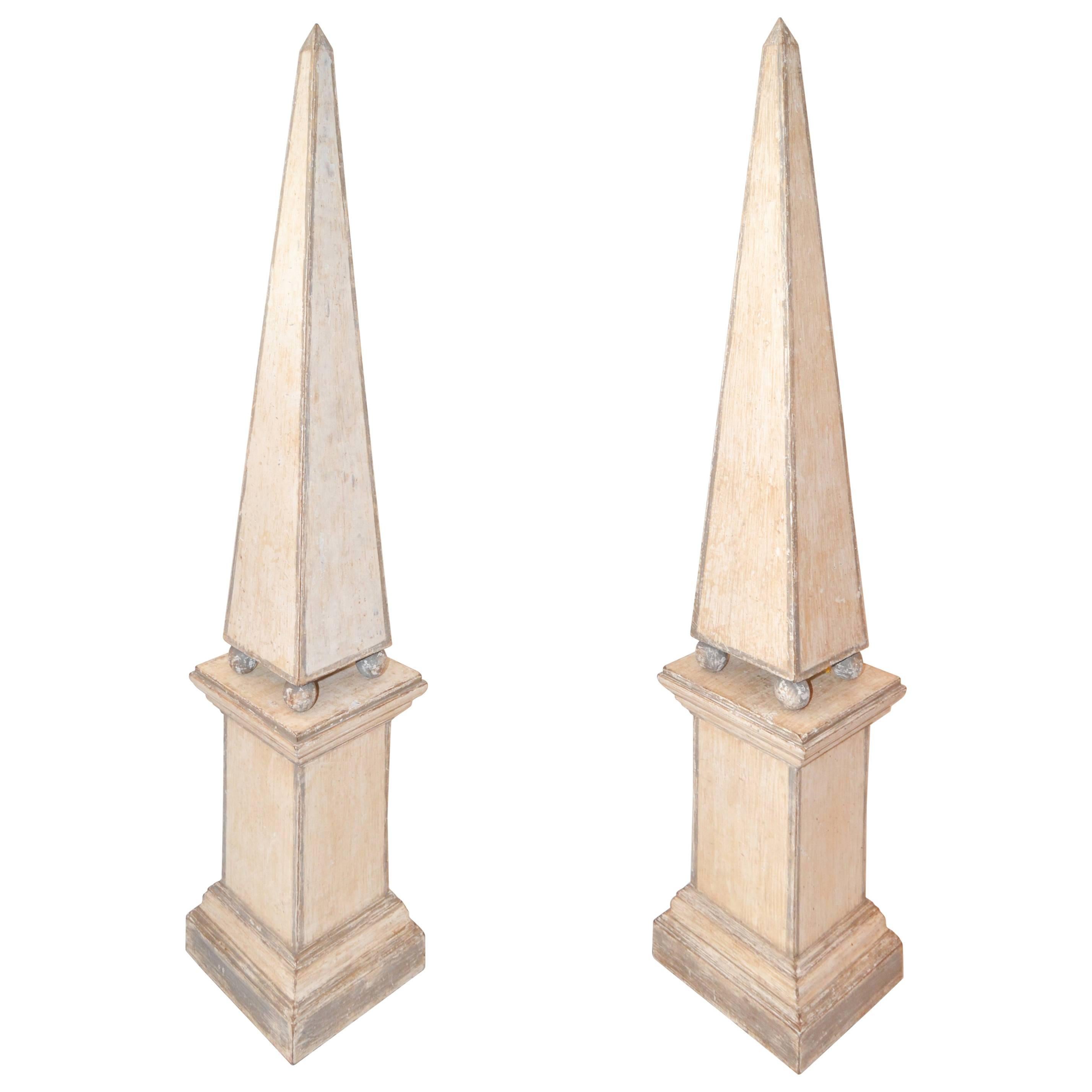 Pair of Tall Painted Obelisks on Bases