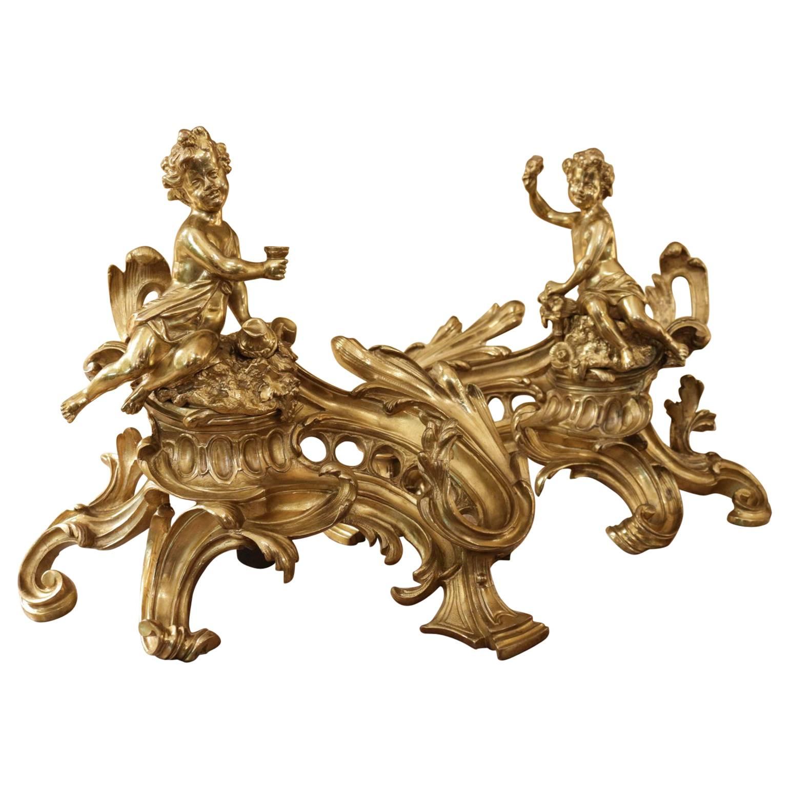 Pair of French Rococo Gilded Bronze Endiron with Putti, 19th Century