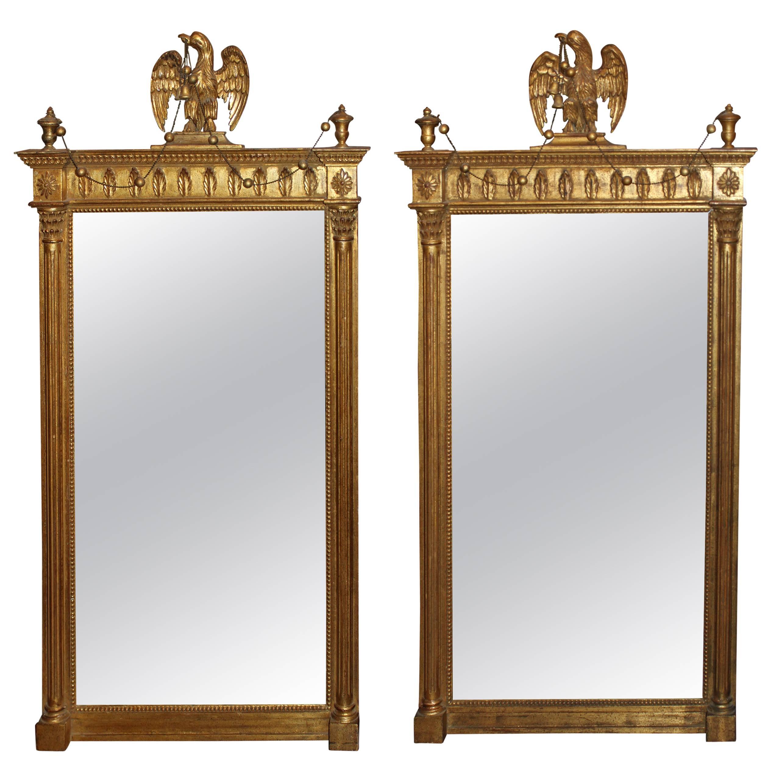 Pair of Classical Style Giltwood Mirrors with Carved Eagles