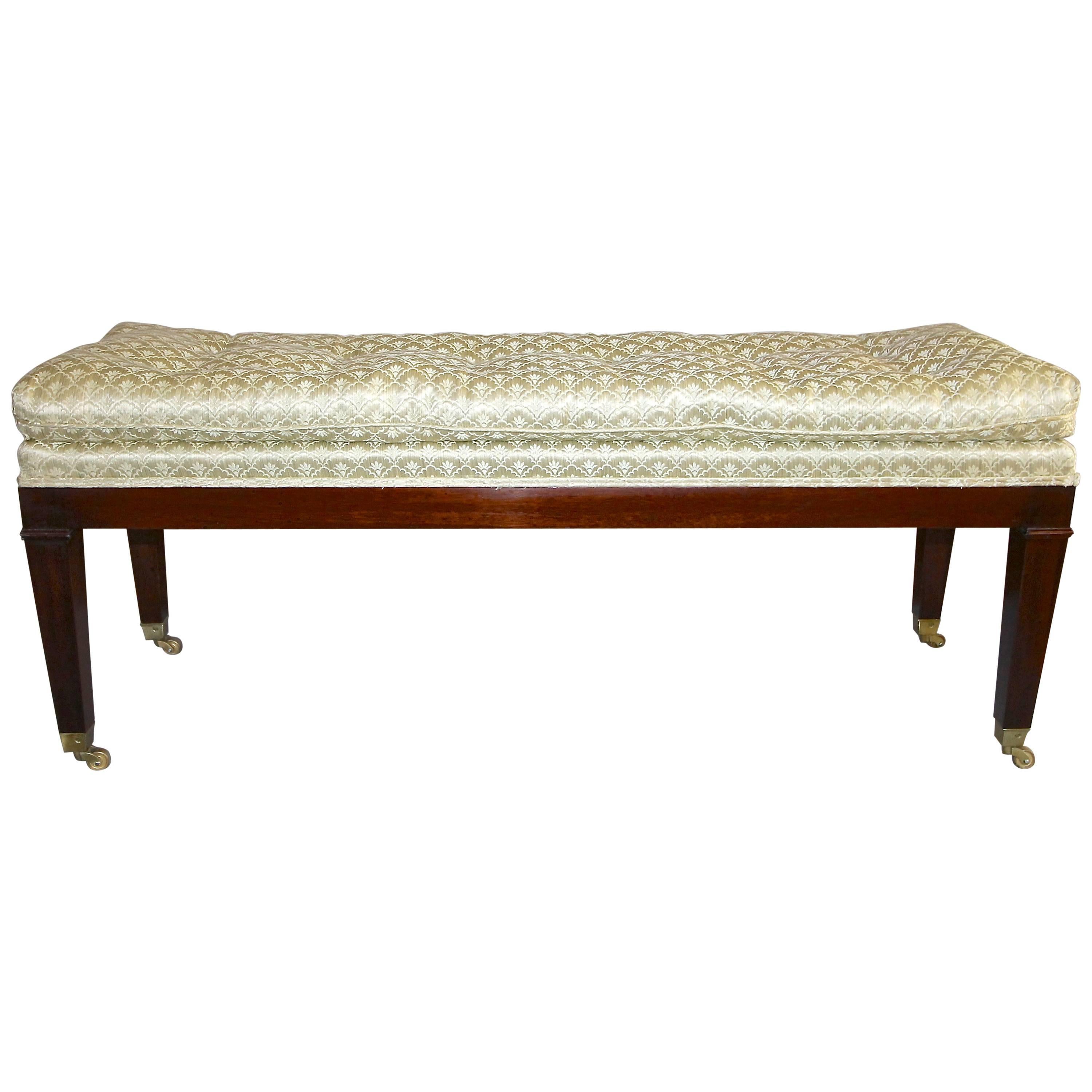 Upholstered Mahogany Long Bench with Brass Casters For Sale