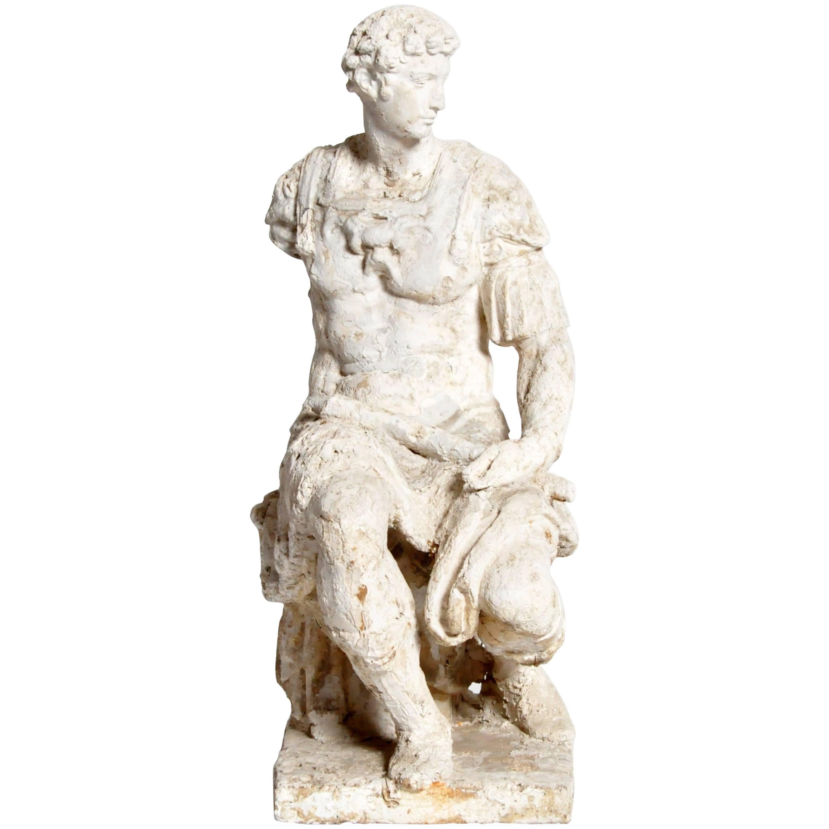 Garden Statue of a Seated Roman Soldier