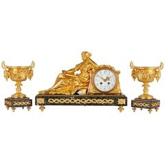 French Gilt Metal and Marble Antique Three-Piece Clock Set
