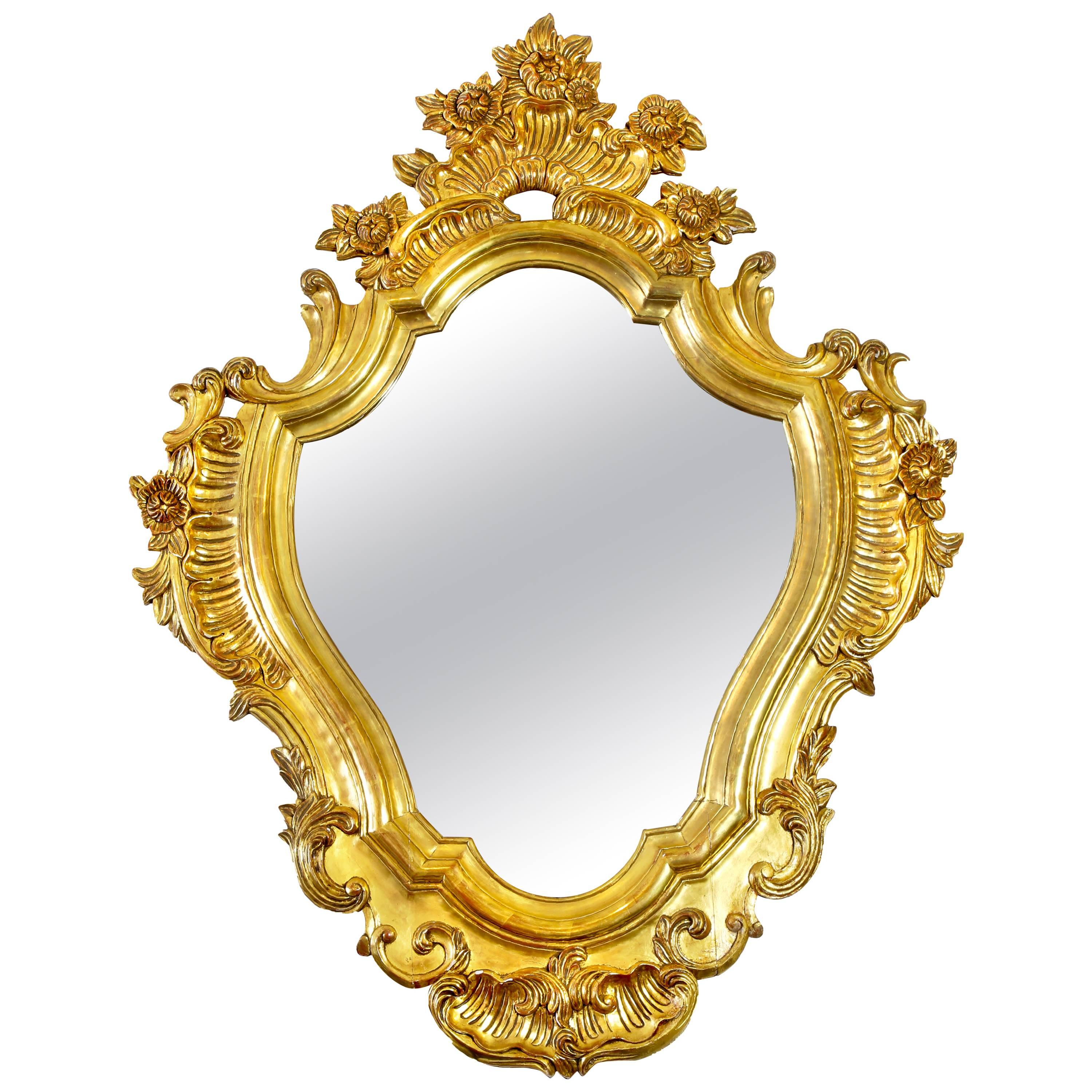 Italian Floral Scrolled Giltwood Wall Mirror For Sale
