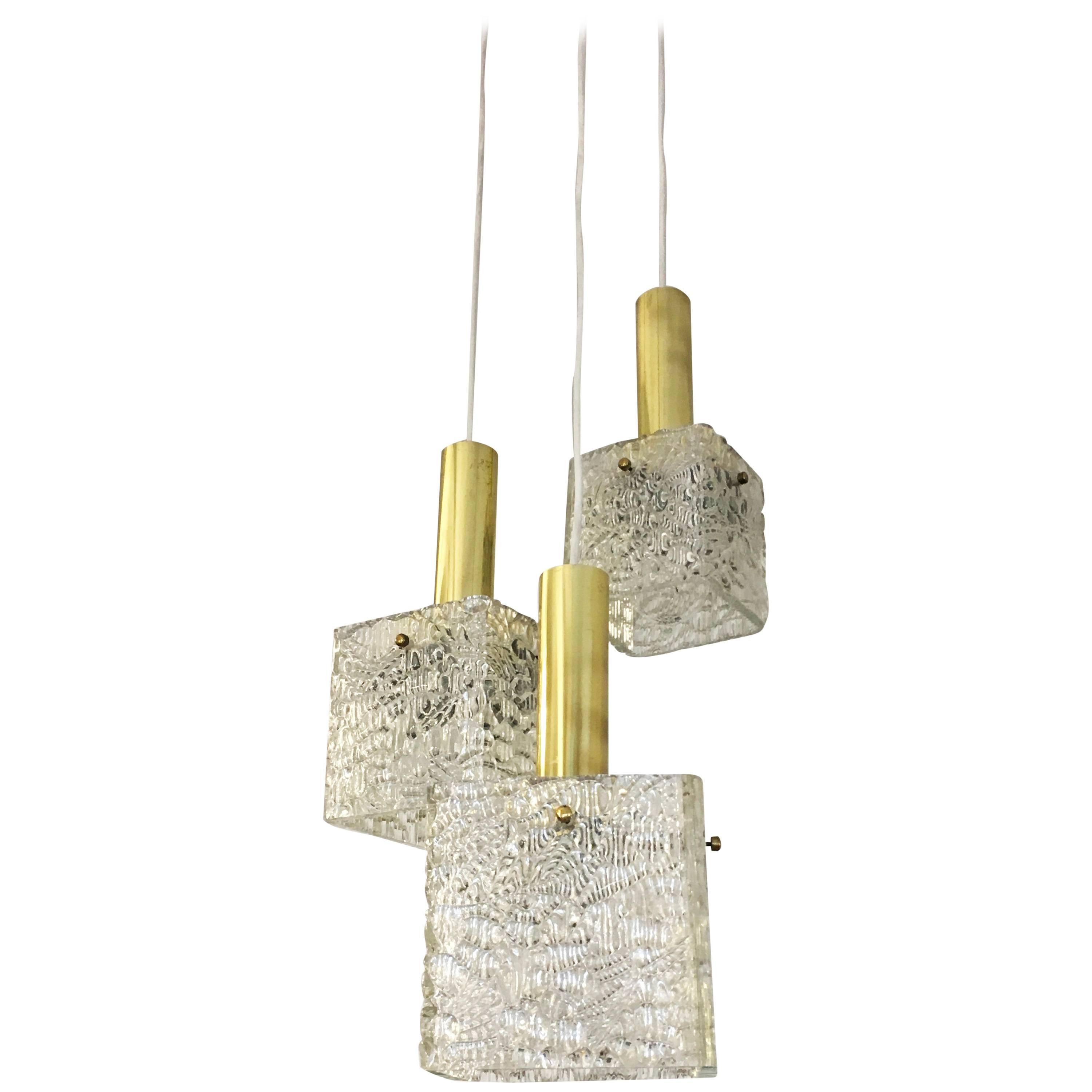 Cascading Textured Glass and Brass Chandelier by J.T. Kalmar