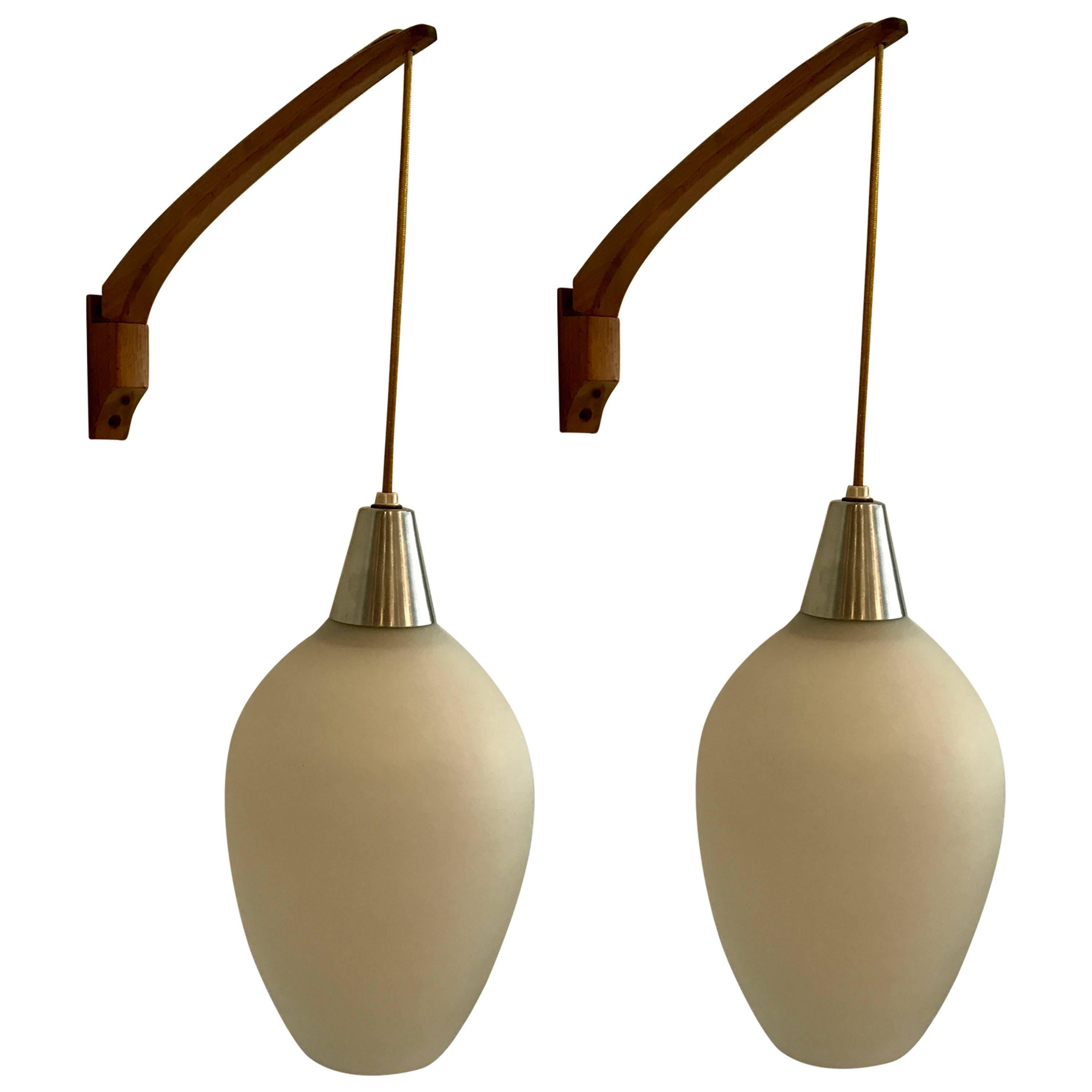 Pair of Satin Glass and Teak Swivel Wall Mount Pendant Lights, Stilnovo, Italy