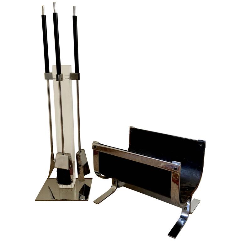 Fireplace set comprised of chrome fire tools with black enameled handles on 4
