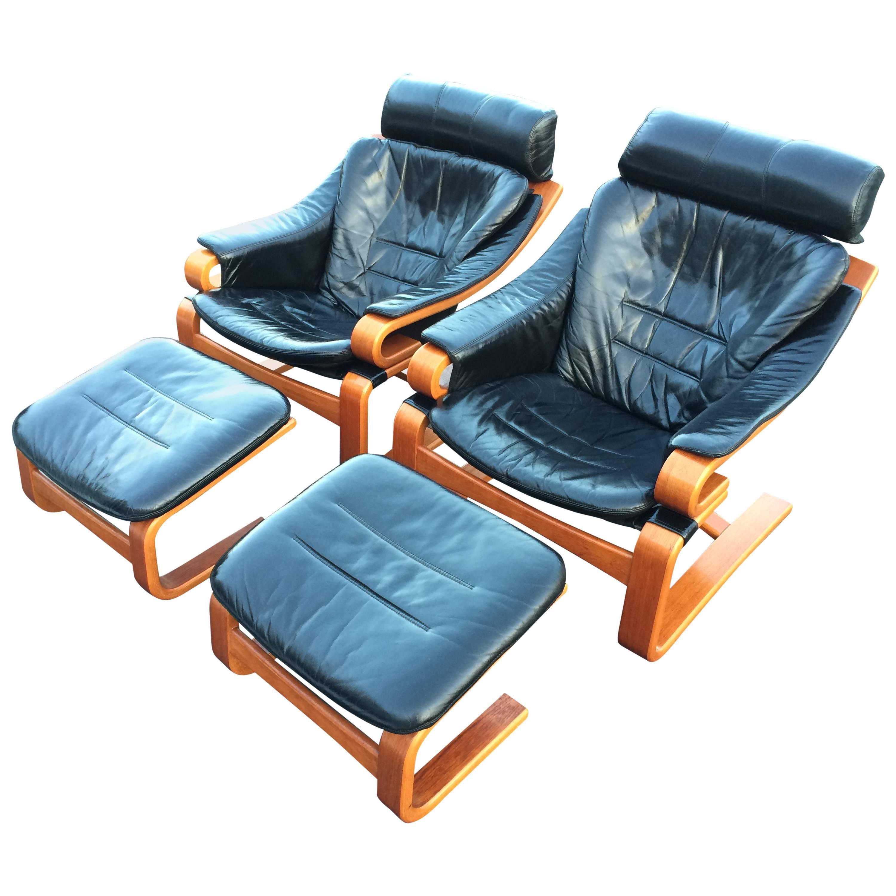Pair of Danish Modern Leather Lounge Chairs with Ottomans