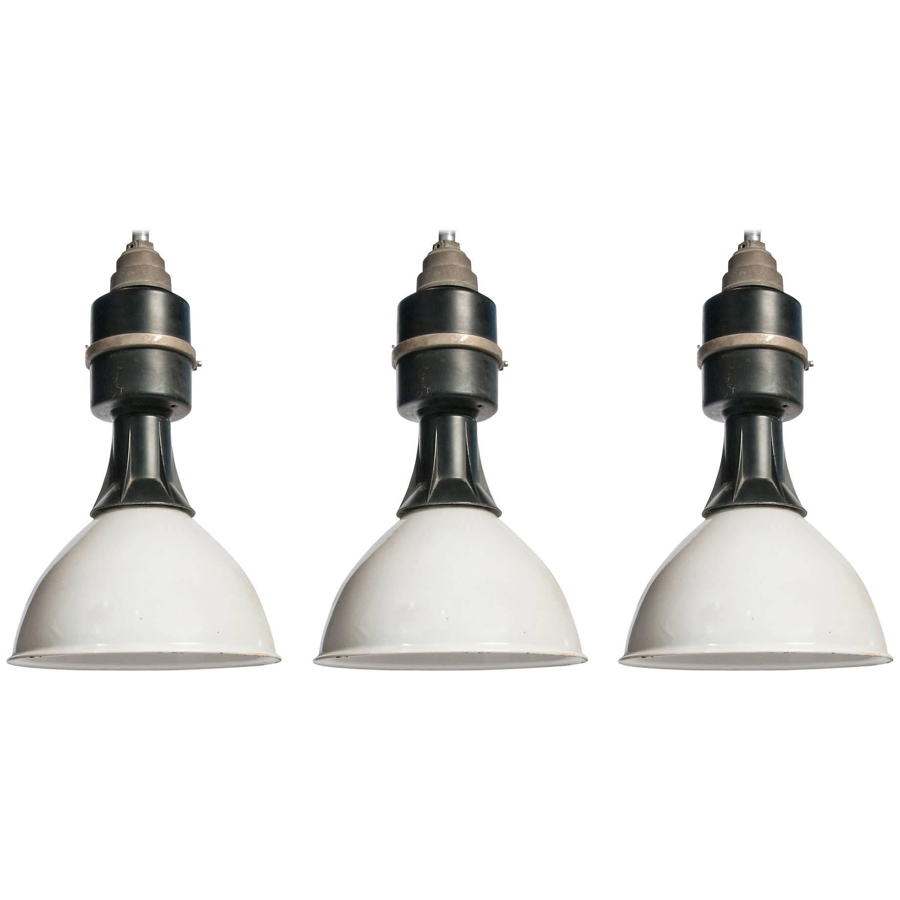 Set of Three Industrial Black and White Pendant Lights For Sale